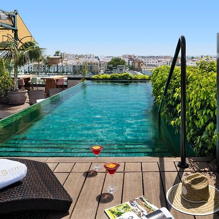 Hotel Lobby เซบีญา ภายนอก รูปภาพ Rooftop pool