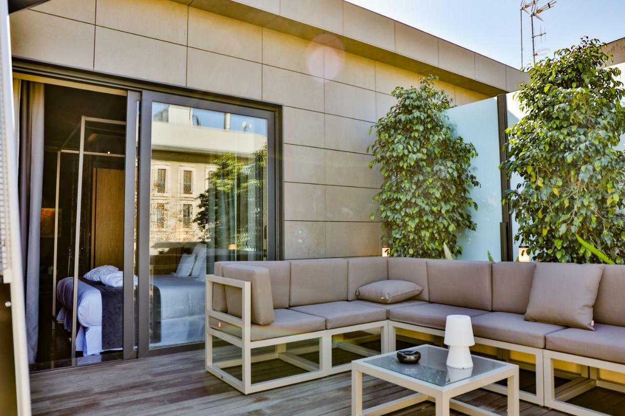 Hotel Lobby เซบีญา ภายนอก รูปภาพ The hotel's rooftop