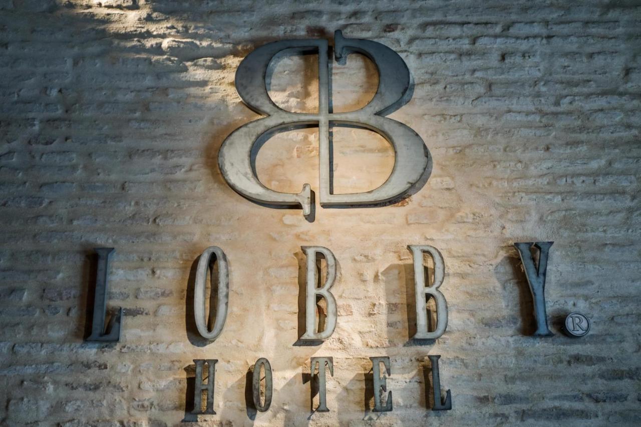Hotel Lobby เซบีญา ภายนอก รูปภาพ The logo of the 88th Fighter Group